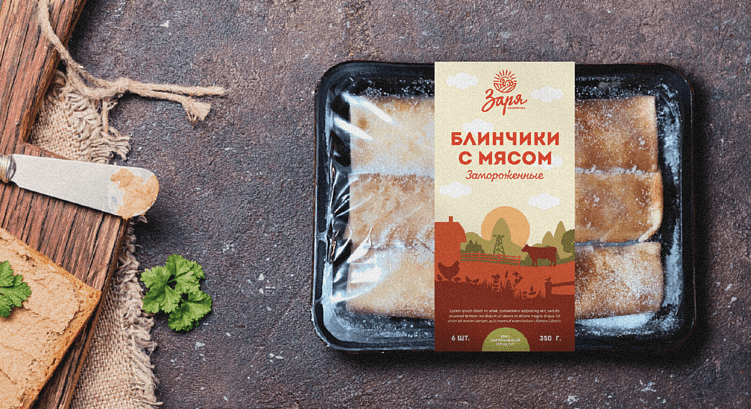 Замороженные блинчики с мясом от хозяйства «Заря» — упаковка с визуальным кодом фермерства, акцентом на натуральность и локальное производство.